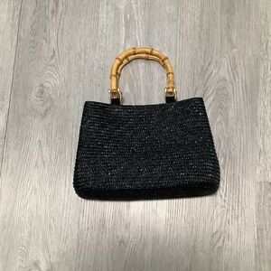 Black straw handbag
